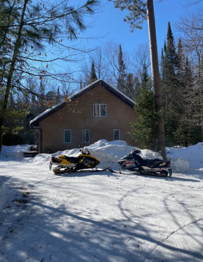 cabin for rent near snowmobile trails, cottage for rent near snowmobile trails, things to do in eagle river, eagle river wisconsin, lynx lake cabin rental, snowmobile get a way cabin